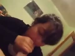 An amateur brunette hair model demonstrates her ability to swallow and use oral stimulation.